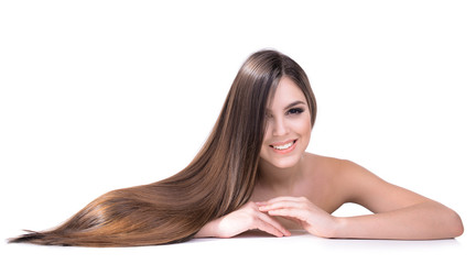 Obraz premium Beautiful young woman with long hair isolated on white