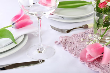 Table setting with spring flowers close up