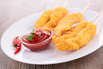 breaded meat and ketchup