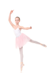 Fototapeta premium school age girl playing dress up wearing a ballet tutu