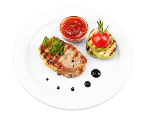 Grilled steak and grilled vegetables on plate, isolated on