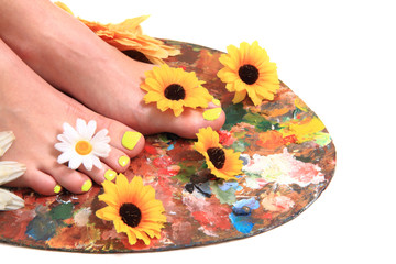 women feet and colors (pedicure background)