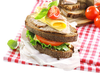 Delicious sandwiches with meet on table close-up
