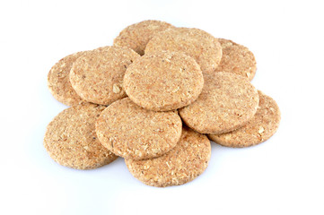 Stack of whole grain cookies isolated on white background