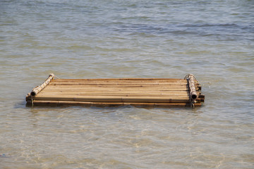 Bamboo raft floating in the sea, Phuket, Thailand