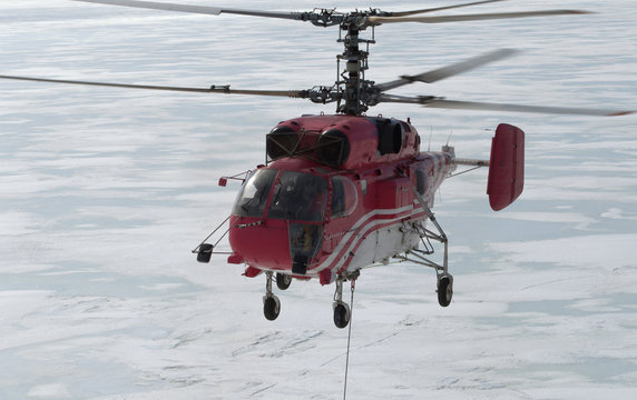helicopter in the sea of antarctic