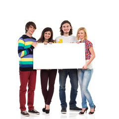 Group of students with empty banner