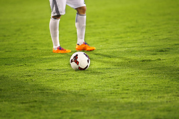 Soccer player and ball