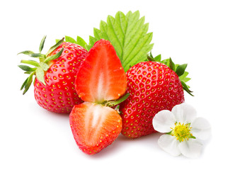 Strawberries with leaves and blossom. Isolated on a white