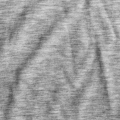 Grey fabric texture with delicate striped pattern.
