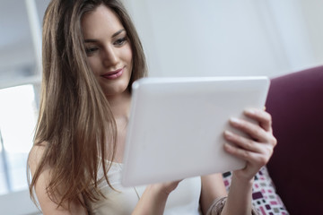 Fototapeta premium Young woman with tablet