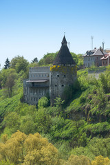 Obraz premium Tower on the rocky shore.