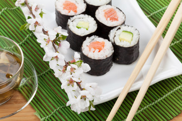 Japanese food and fresh sakura branch