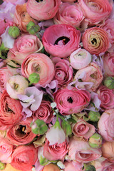 Obraz na płótnie Canvas Pink roses and ranunculus bridal bouquet
