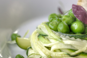 Grilled Butter fish steak with pea stew braised in white wine.
