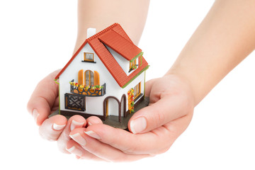 house in hands - real estate concept