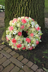 Sympathy wreath near tree