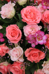 Pink rose and freesia bridal flowers