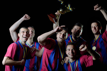 soccer players celebrating victory