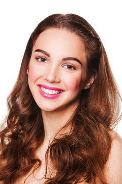 Portrait of Beautiful smiling Woman with pink lips looking at