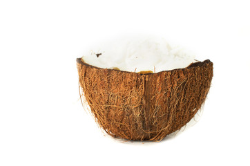 Coconut fruit cut in half on white background