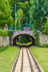 Cute dreamy railway tunnel path under the bridge