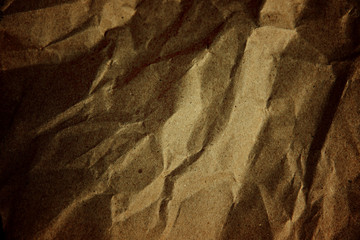 Paper box texture in crumpled of dark color.