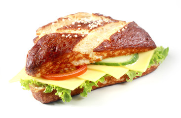 Gouda cheese on a lye bread roll