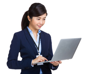 Businesswoman using laptop computer