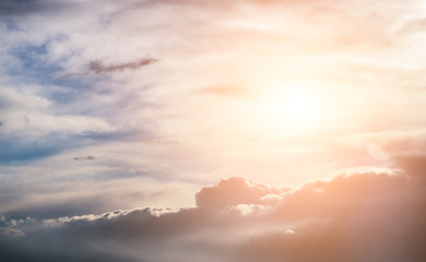 Fototapeta premium Dramatic sunset sky with clouds and sun.