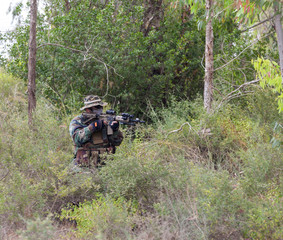 Fototapeta premium military weapons in the woods