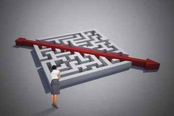 Composite image of businesswoman standing