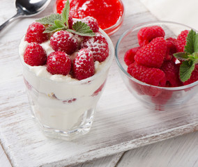 dessert with raspberries and mint leaf