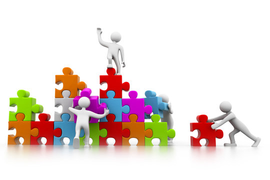 Business teamwork building puzzles together