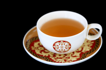 cup of tea on black background