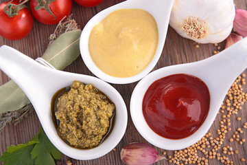 mustard, ketchup and pesto auce