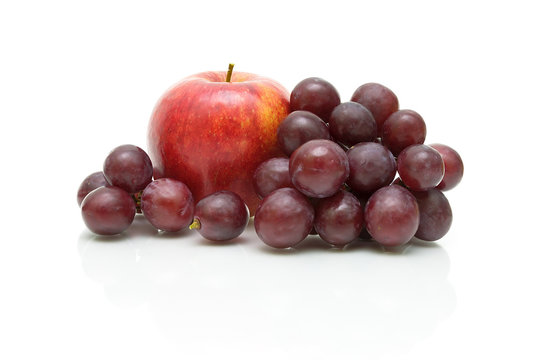 apple and grape close-up on white background