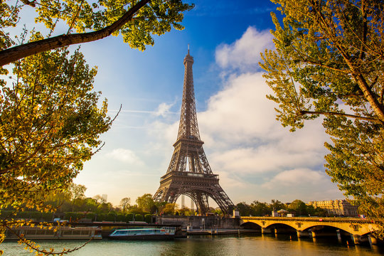 Eiffel Tower with boat on Seine in Paris, France