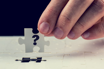 Final puzzle piece with a question mark