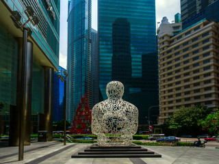Statue in Singapore Business District - obrazy, fototapety, plakaty