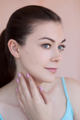 Fototapeta premium Beautiful young woman with natural daily makeup and manicure bea