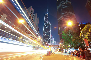 Fototapeta na wymiar Road light trails on streetscape buildings in HongKong