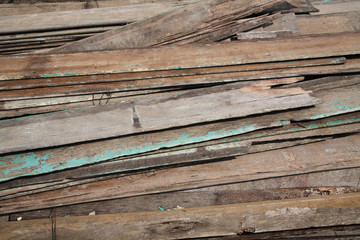 Stack of old and dirty lumber