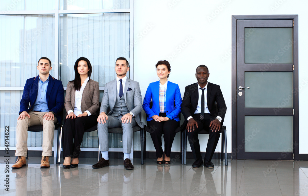 Wall mural business people waiting for job interview