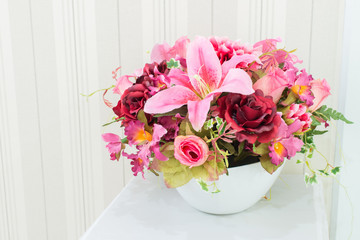 Artificial flowers in the basket