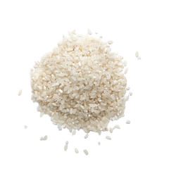 White dry uncooked grain rice on a white background