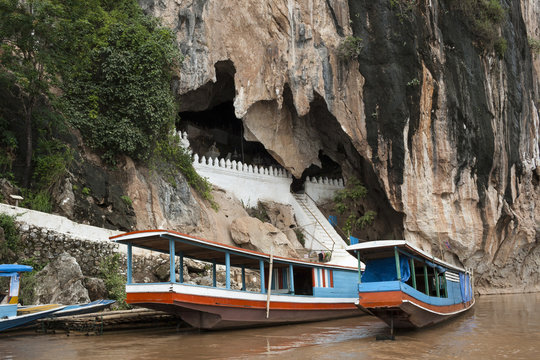Pak Ou Caves - Typical tourist boat along Mekong river