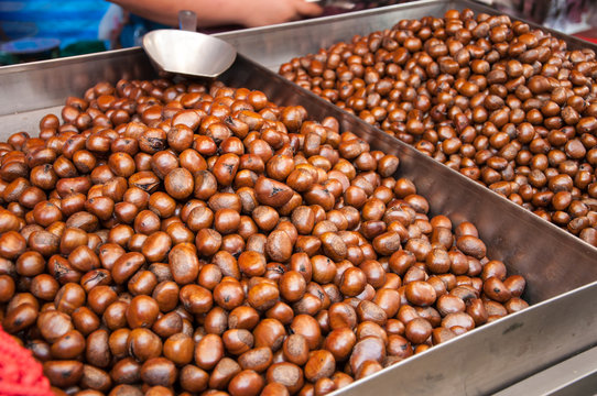 pile of roasted chestnut for retail sale in market