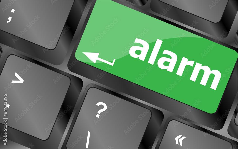 Poster alarm button on a black computer keyboard
