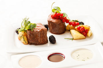 steak with fresh berries